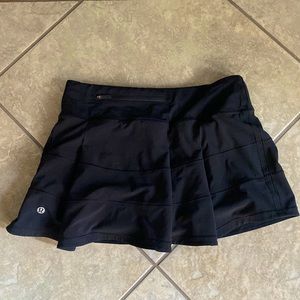 Size 4 lulu lemon black pace rival tennis skirt. gently worn.